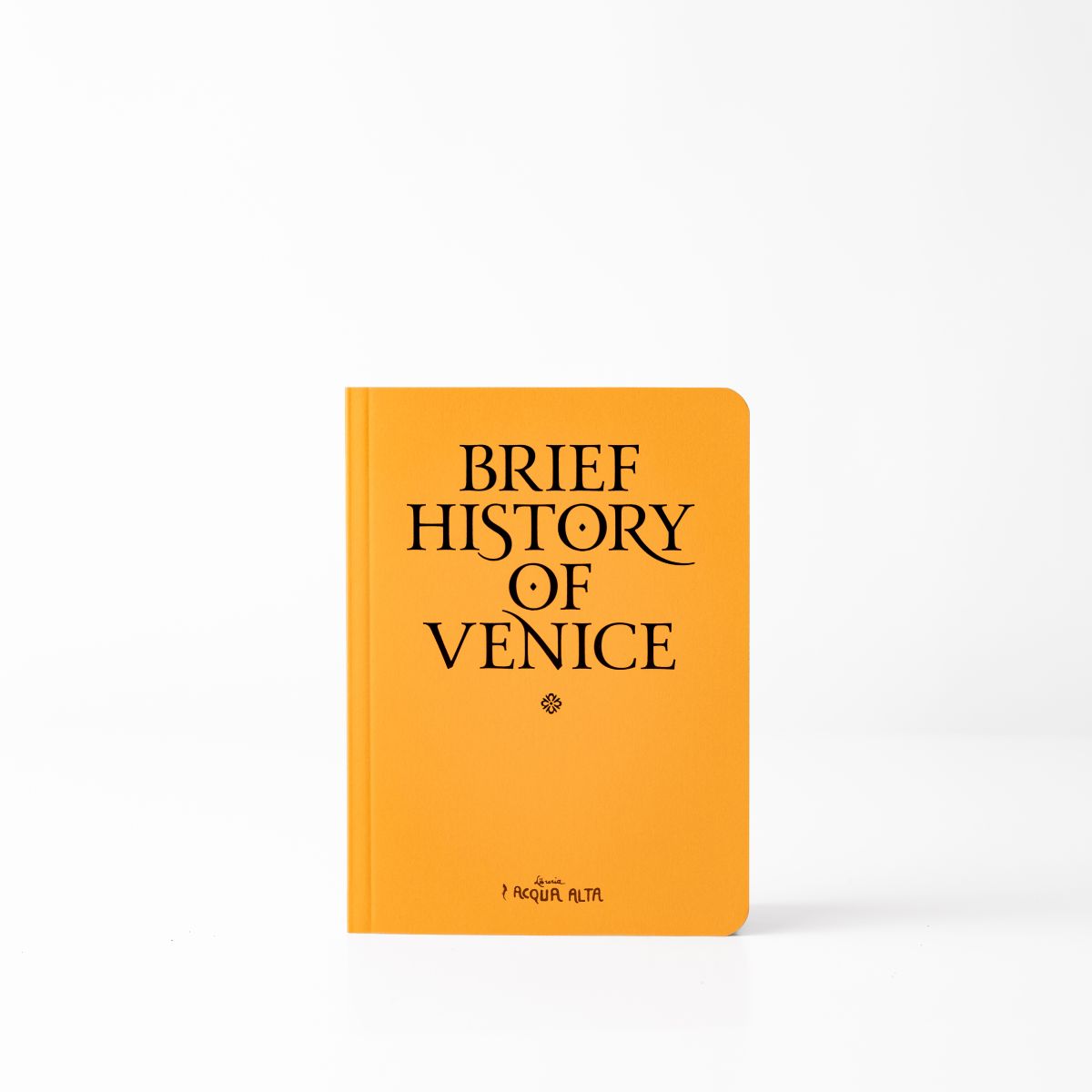 Yellow front cover of A Brief History of Venice featuring the Libreria Acqua Alta logo