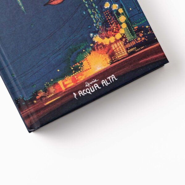 The Great Gatsby - Cover Detail Close-up of the cover of "The Great Gatsby" featuring city lights and the Libreria Acqua Alta logo