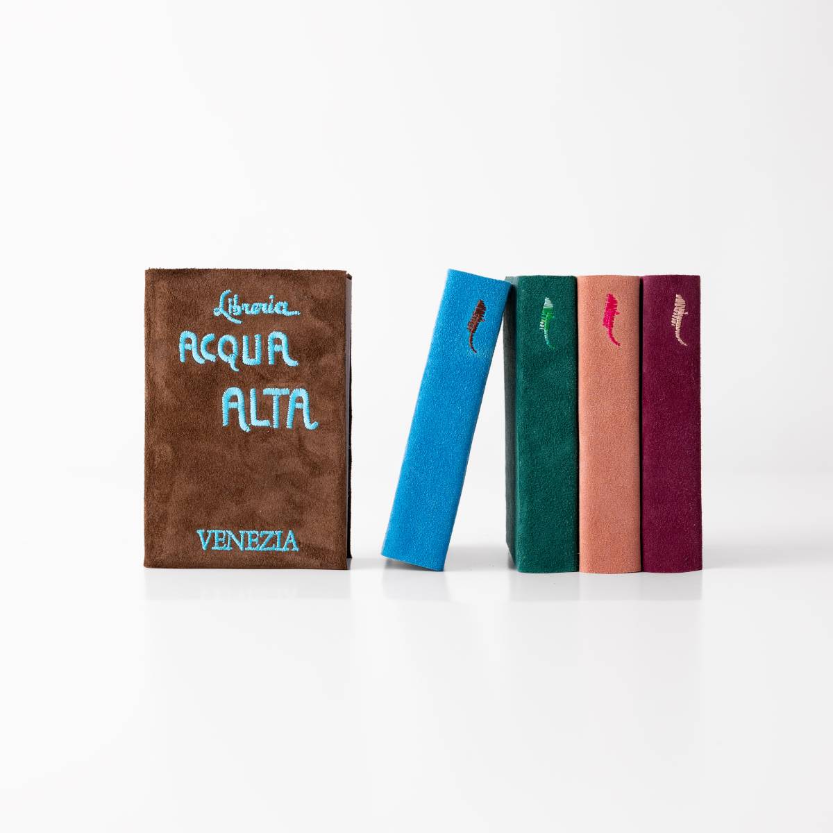 Acqua Alta Bookstore Diaries – Cover Detail Acqua Alta Venice Bookstore Journals with Logo Covers, Set of Colorful Notebooks